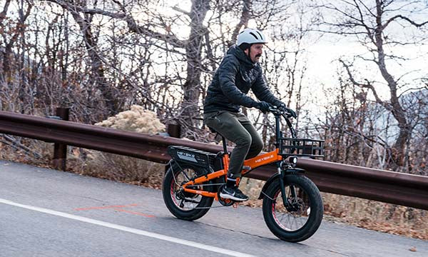 a man is riding Mars 2.0 fat tire ebike downhill